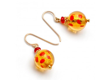 Oorbellen goud en rood van murano-glas rode polka dots