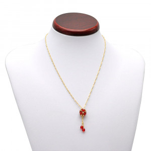 Collier evidence renaissance rouge tisse dore